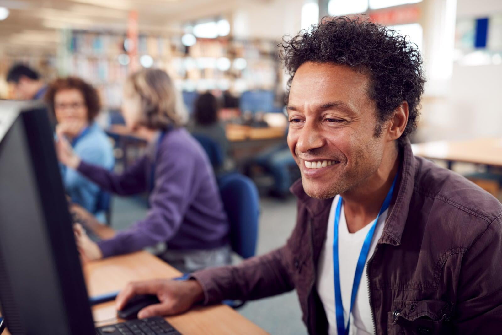 Adult aged user in a computer lab.