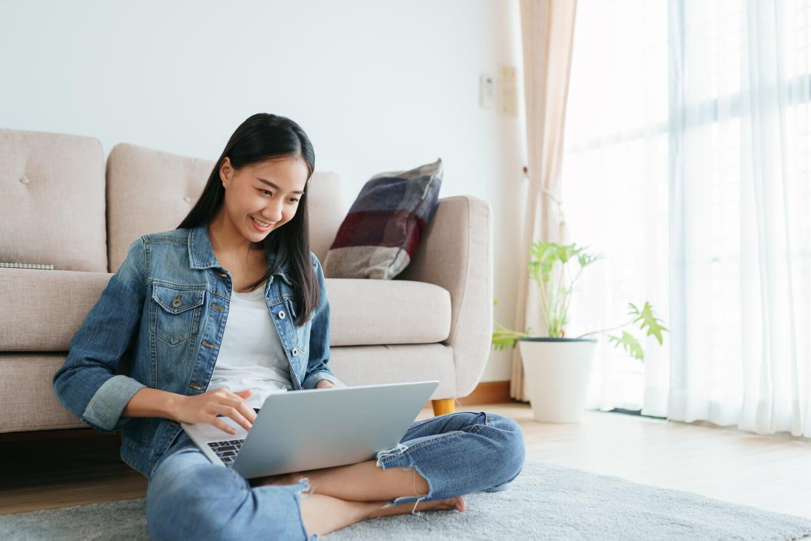 High school aged student with laptop. 